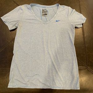 Nike blue and white striped v-neck workout shirt